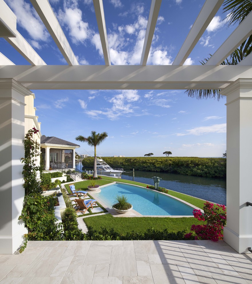 Inspiration for a timeless custom-shaped pool remodel in Tampa