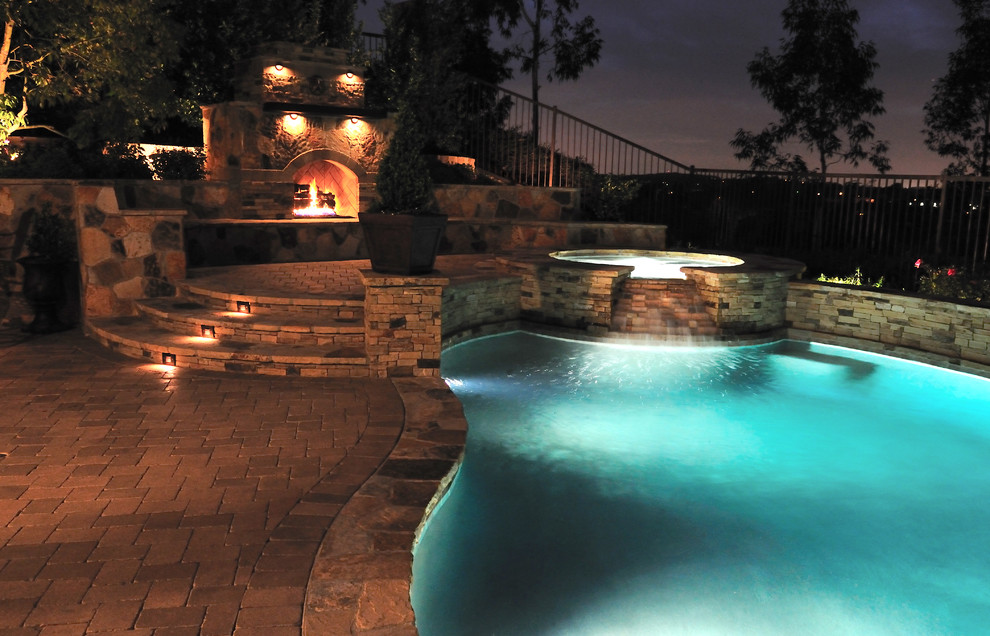 Traditional Pool with Fireplace Traditional Pool Orange County