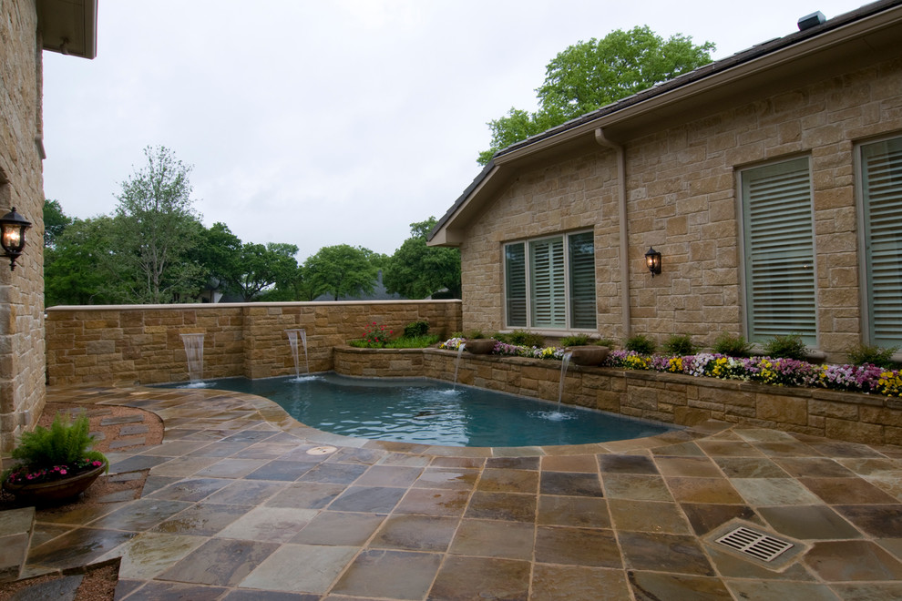 Inspiration for a classic swimming pool in Dallas.