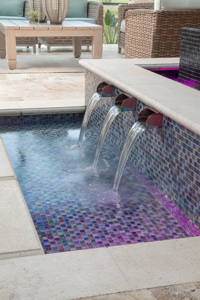 Pool fountain - large transitional backyard stone and custom-shaped pool fountain idea in Tampa