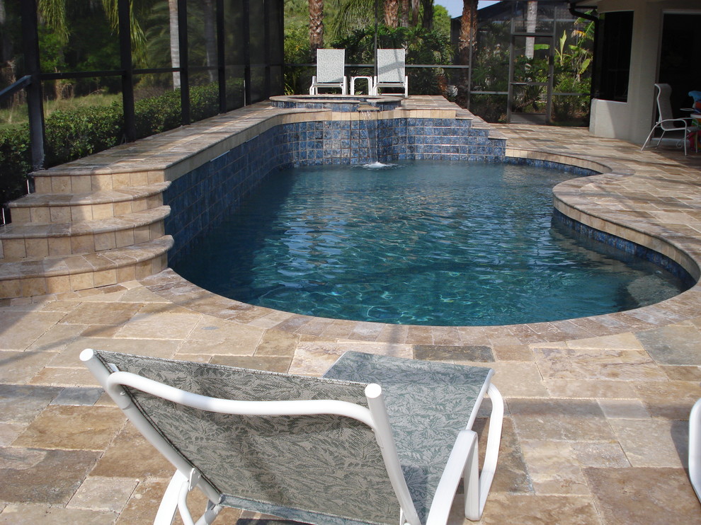 Design ideas for a large world-inspired back custom shaped hot tub in Tampa.