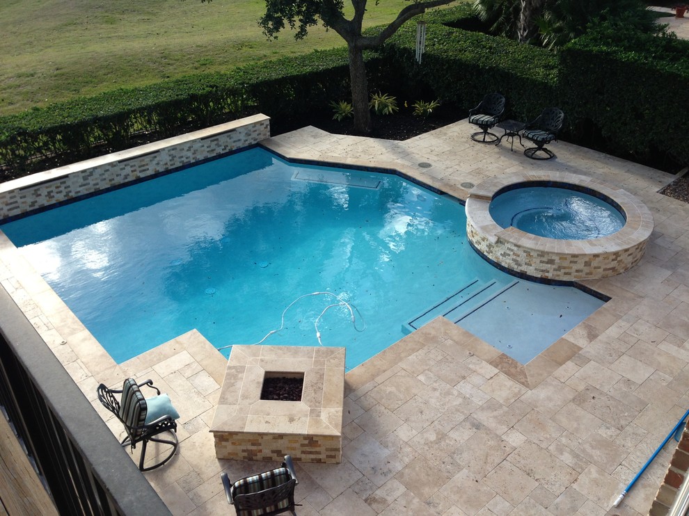 Design ideas for a medium sized classic back custom shaped hot tub in Houston with concrete paving.