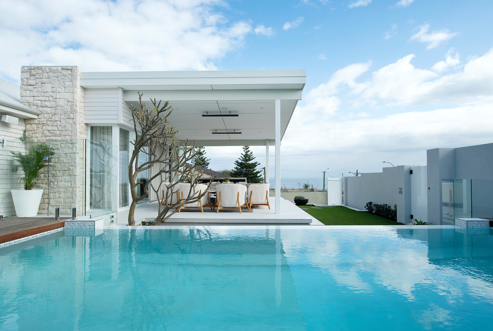 Inspiration for a mid-sized coastal pool remodel in Perth