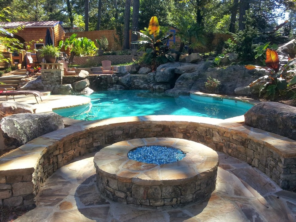 Island style pool photo in Atlanta