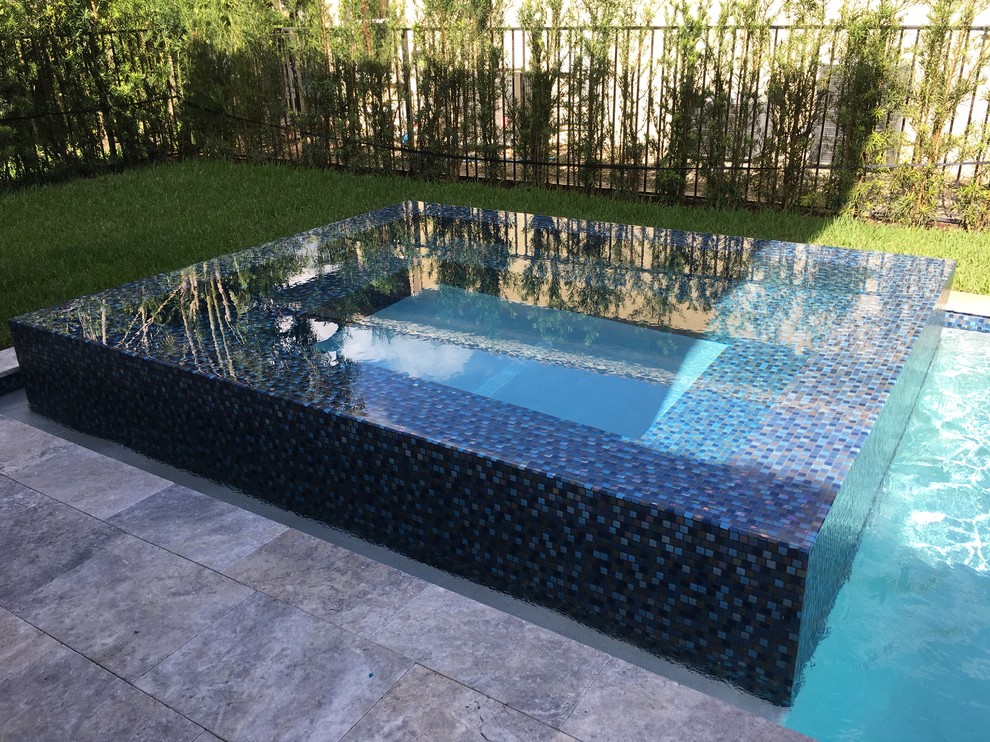 tucker design Eclectic Pool Miami by tucker design build inc