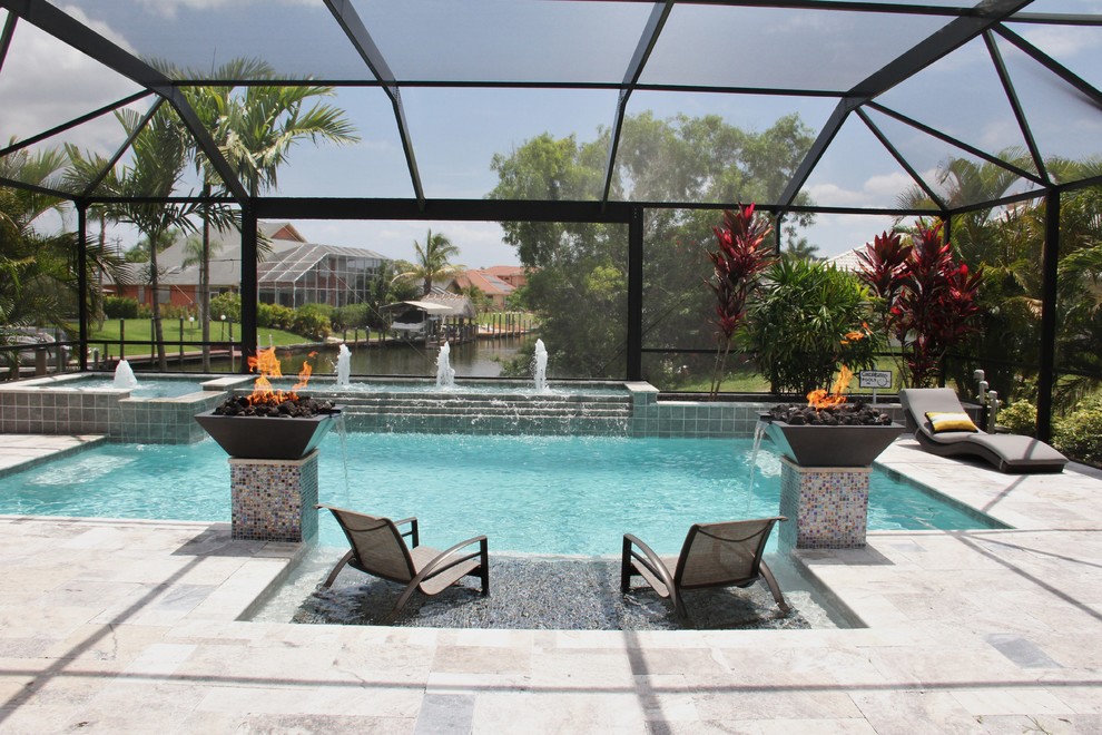 Medium sized contemporary indoor rectangular swimming pool in Miami with a pool house and tiled flooring.