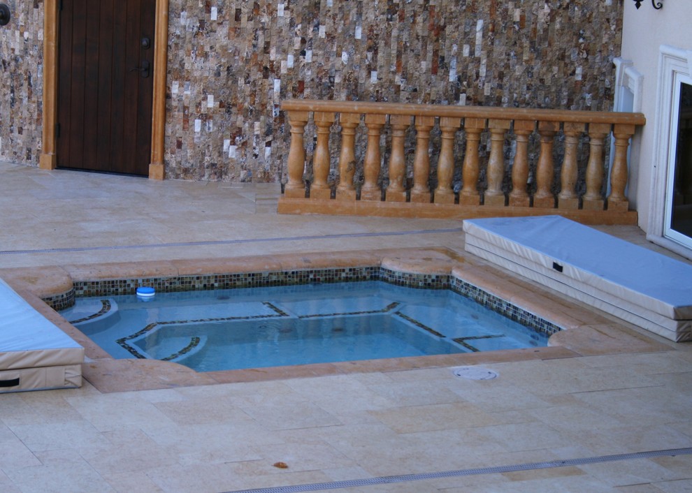 This is an example of a mediterranean swimming pool in Milwaukee.