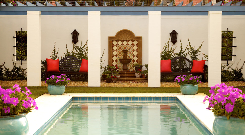 Pool - mediterranean rectangular pool idea in Miami