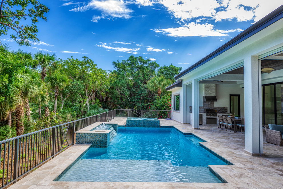 Pool - backyard rectangular lap pool idea in Miami