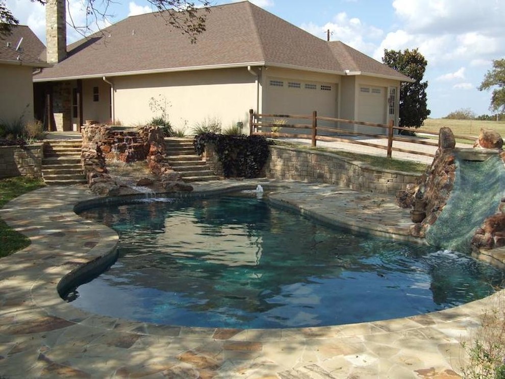 This is an example of a large modern front custom shaped natural hot tub in Dallas.