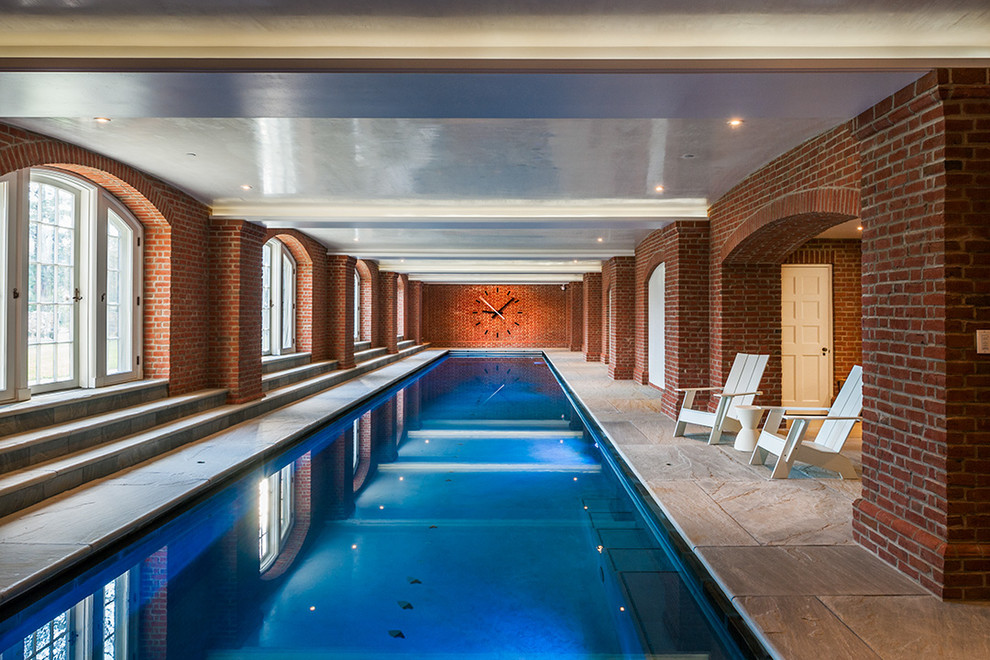 Inspiration for a timeless indoor tile and rectangular pool remodel in Philadelphia