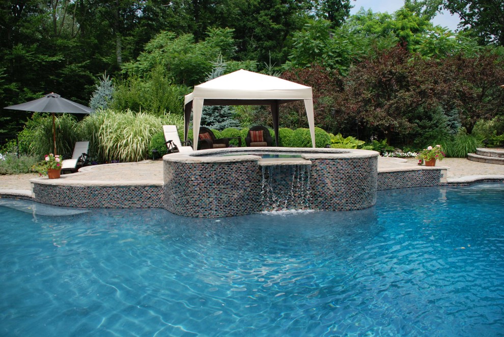 Design ideas for a traditional swimming pool in New York.