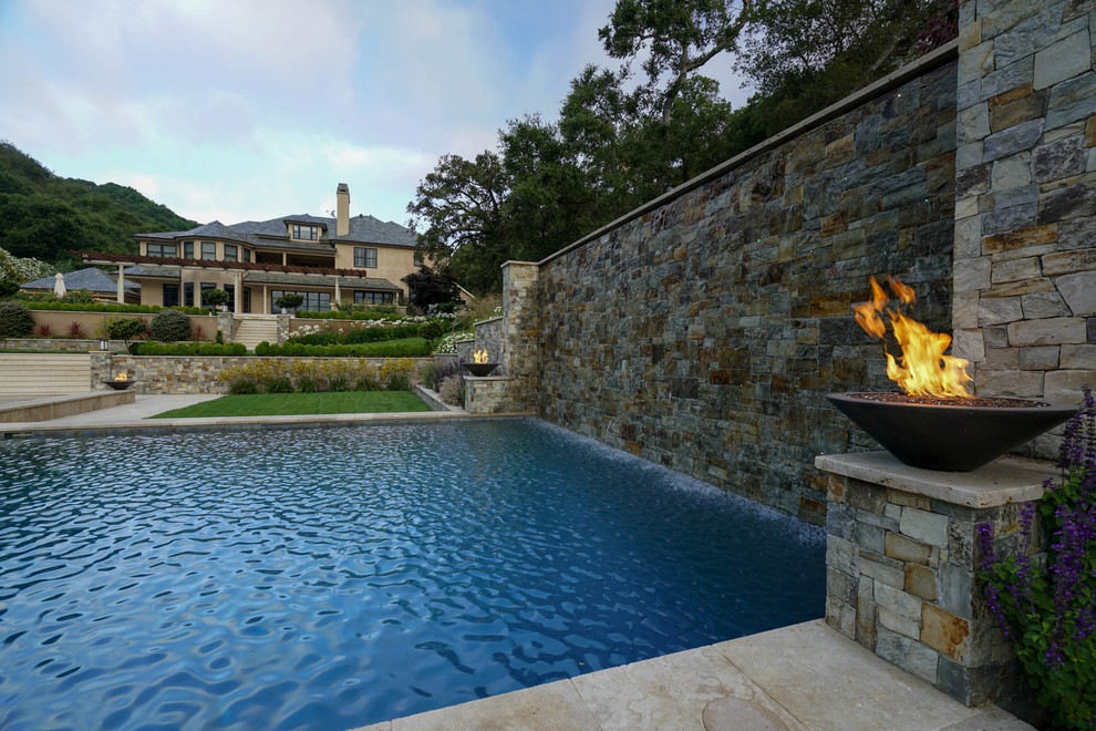 Pool fountain - large contemporary backyard stone and rectangular natural pool fountain idea in San Francisco