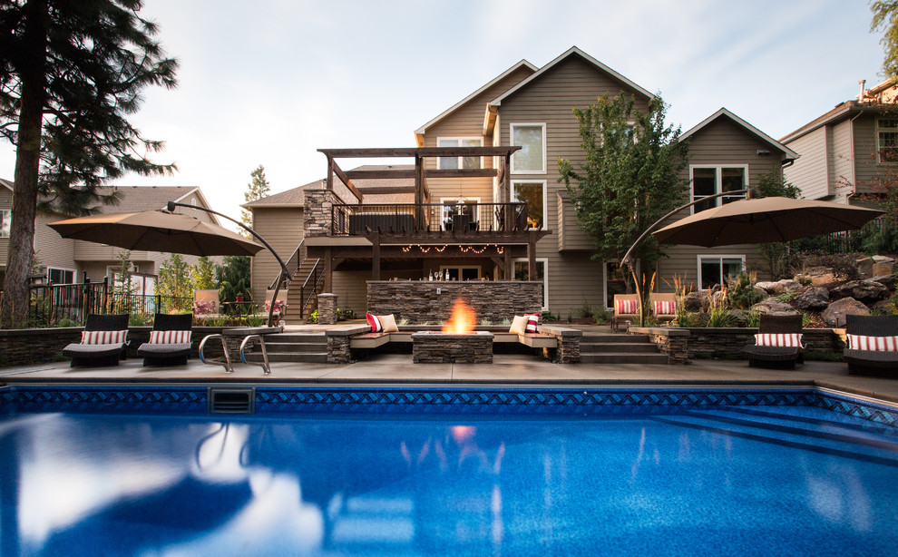 Design ideas for a contemporary swimming pool in Seattle.