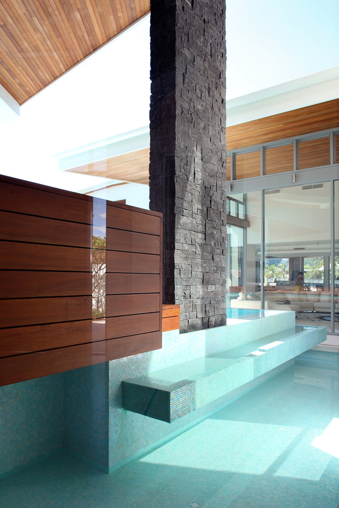 Design ideas for a contemporary swimming pool in Sunshine Coast.