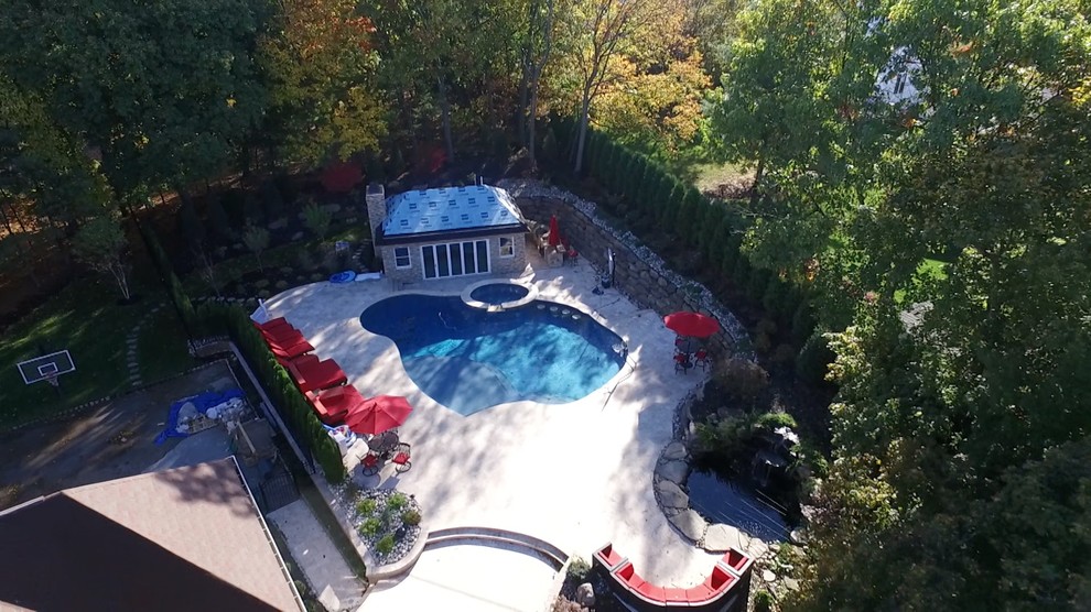 Photo of a medium sized classic swimming pool in New York.