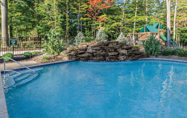 Design ideas for a traditional swimming pool in Cleveland.