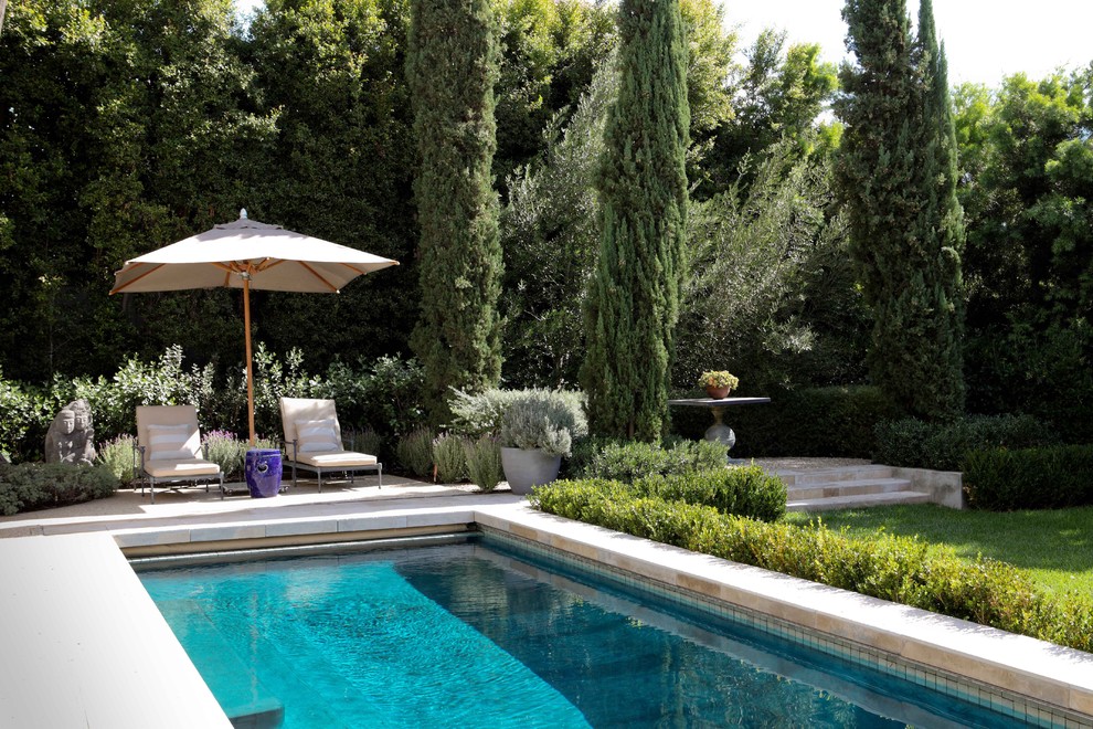 Example of a tuscan rectangular lap pool design in Los Angeles