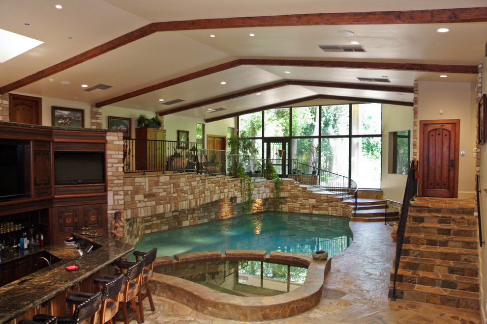 Inspiration for a rustic pool remodel in Houston