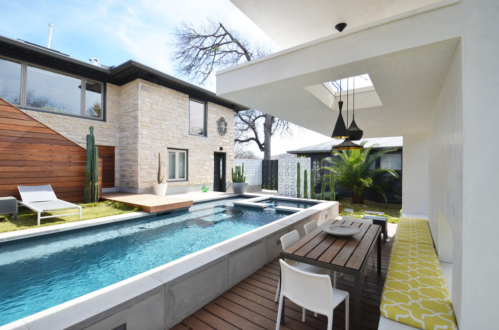 Contemporary rectangular swimming pool in Austin.