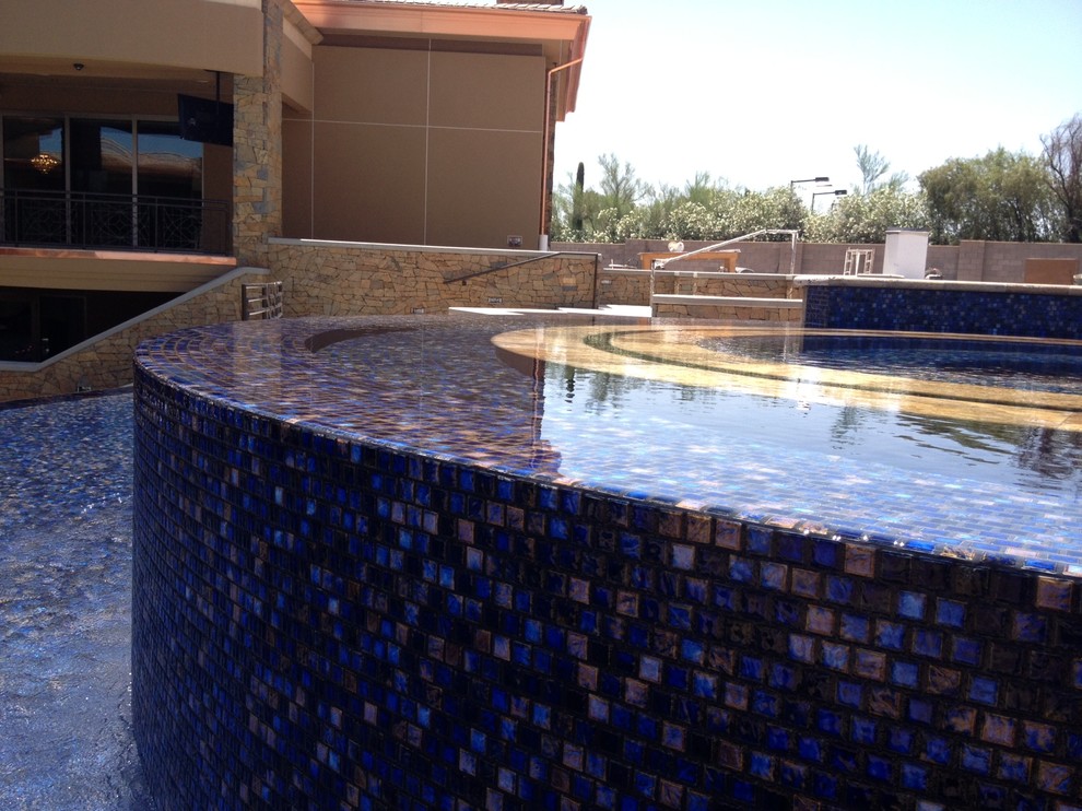 This is an example of a contemporary swimming pool in Phoenix.