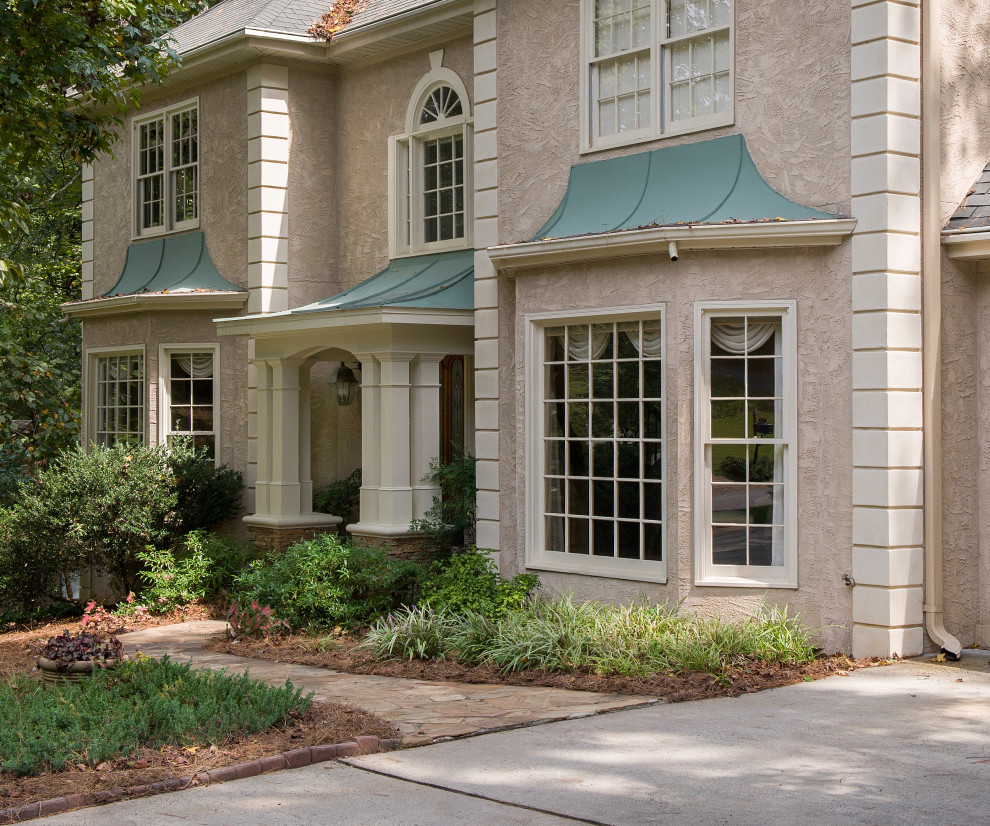 4 column portico on stucco home Transitional Porch Atlanta by