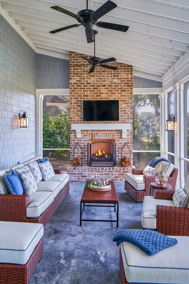 Inspiration for a timeless tile screened-in porch remodel in Atlanta with a roof extension