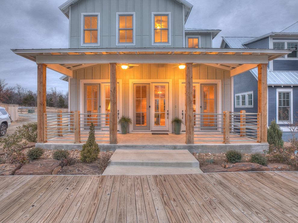This is an example of a cottage porch design in Oklahoma City.