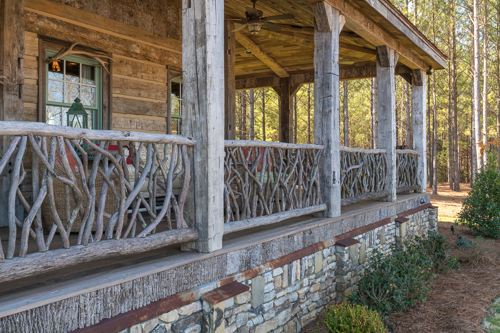 Inspiration for a rustic veranda in Charlotte.