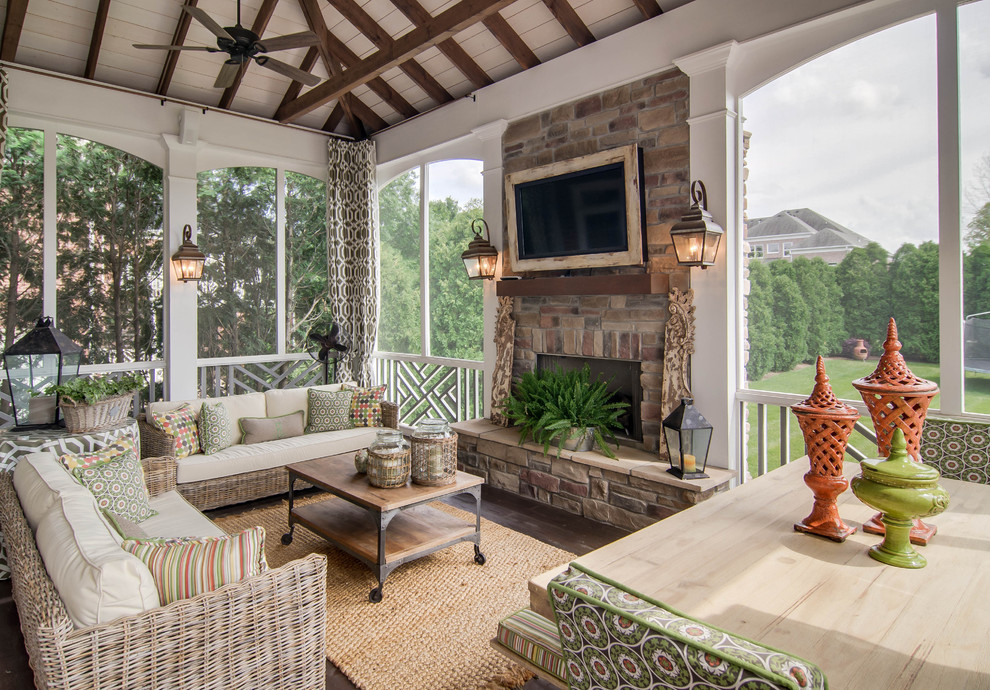 Elegant porch photo in Nashville with a fire pit, decking and a roof extension