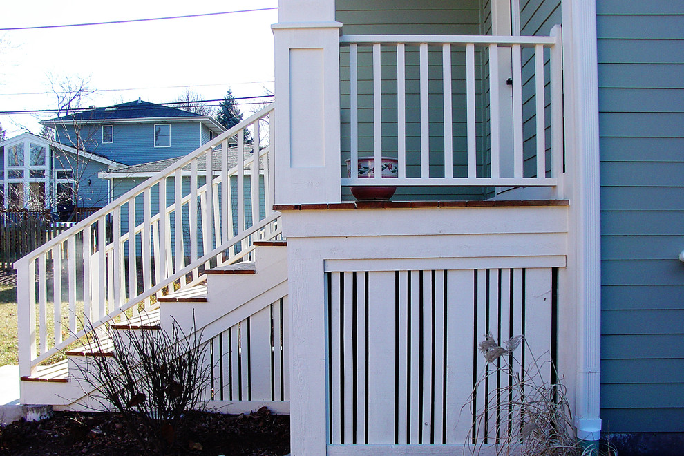 Idéer för stora vintage verandor på baksidan av huset, med takförlängning