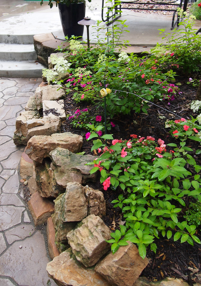 A 'Splash' of Color Eclectic Porch Omaha by Kinghorn Gardens