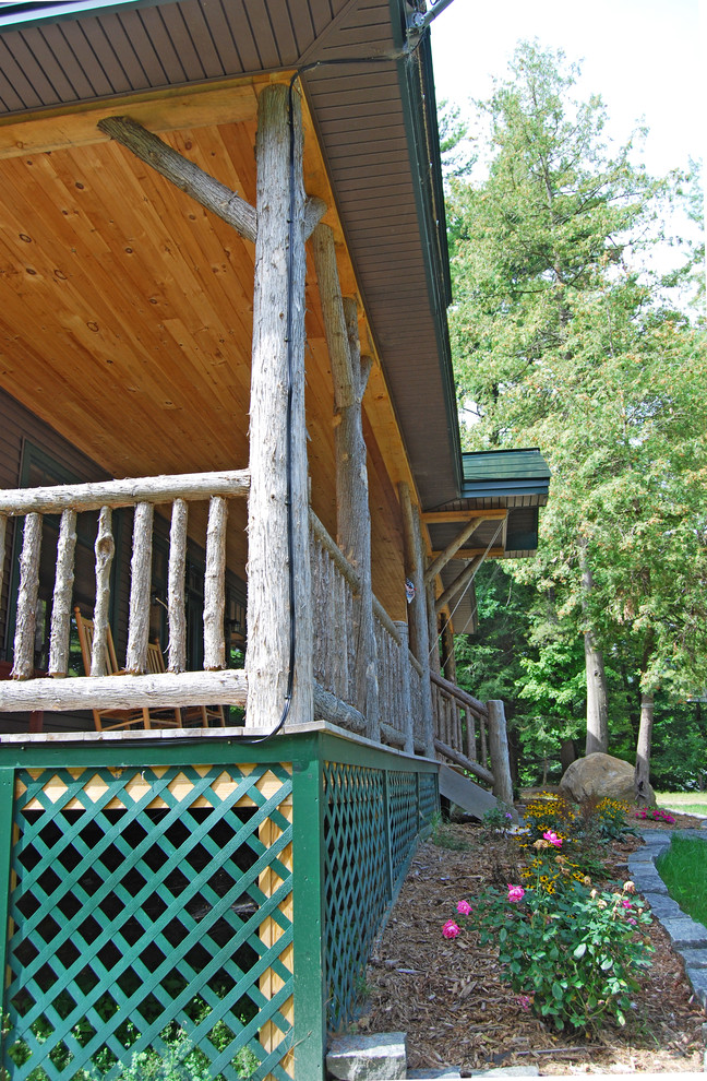 Exempel på en rustik veranda