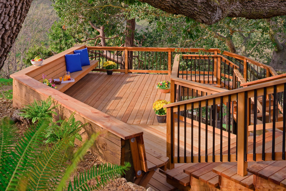 Inspiration for a large contemporary back porch remodel in San Francisco with decking