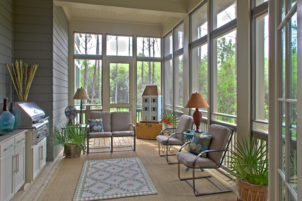 Eclectic porch photo in Miami with decking and a roof extension