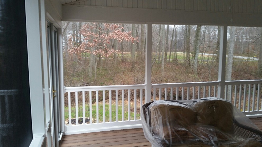 Medium sized classic back veranda in Philadelphia with a roof extension.