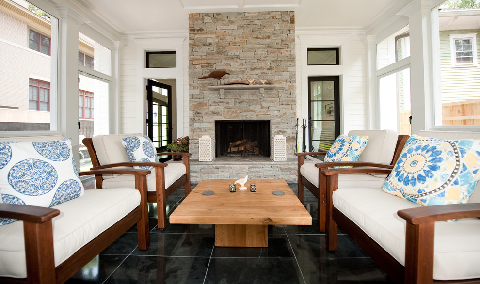 This is an example of a mid-sized transitional tile screened-in back porch design in Atlanta with a roof extension.
