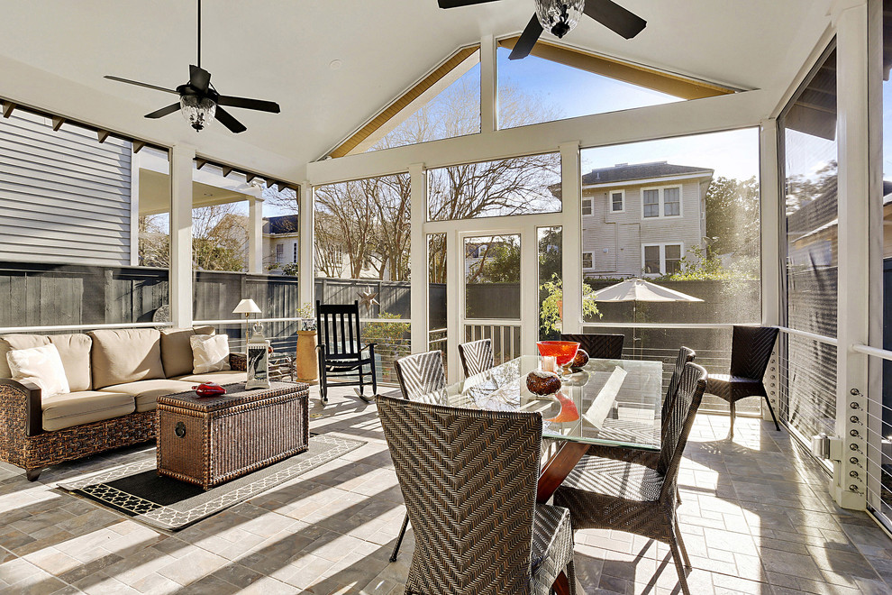 Design ideas for a classic veranda in New Orleans with a roof extension and all types of cover.