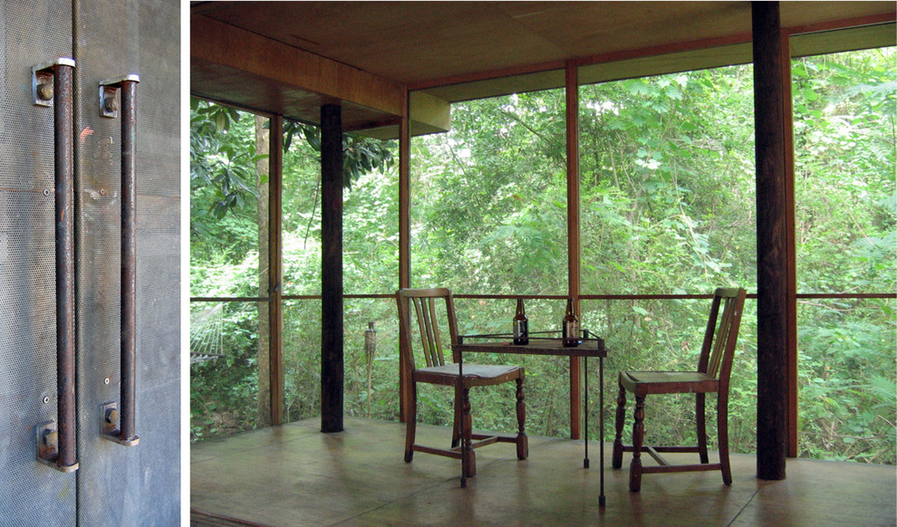 Inspiration for a small zen screened-in back porch remodel in Raleigh with a roof extension