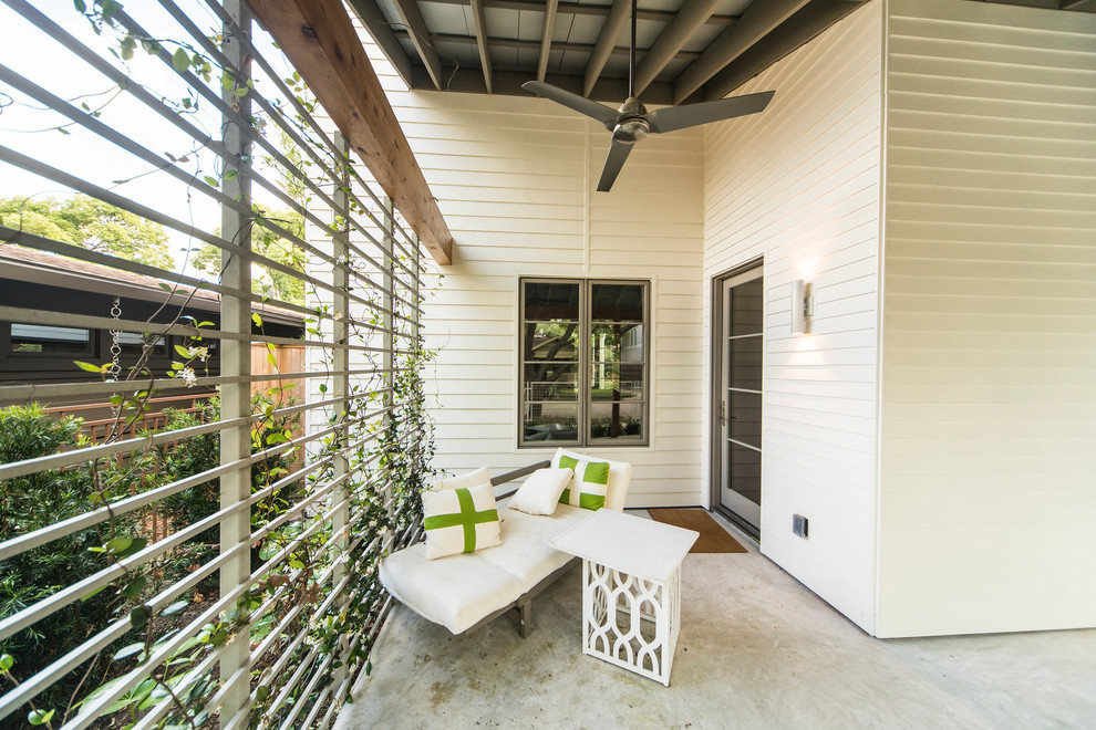 Mittelgroßes, Überdachtes Klassisches Veranda im Vorgarten mit Betonplatten in Houston