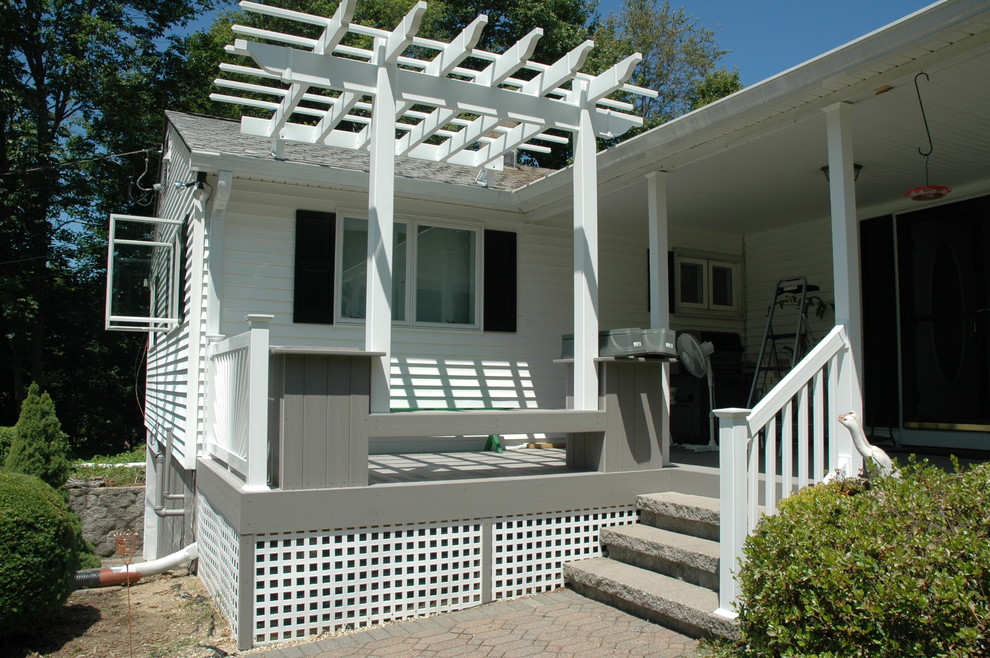 Cette photo montre un porche d'entrée de maison éclectique.