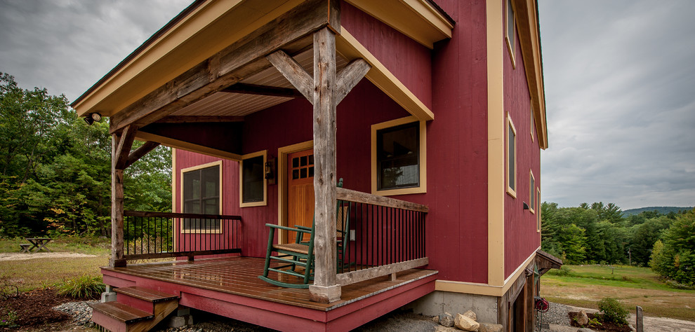 Idéer för en mellanstor rustik veranda framför huset, med trädäck och takförlängning