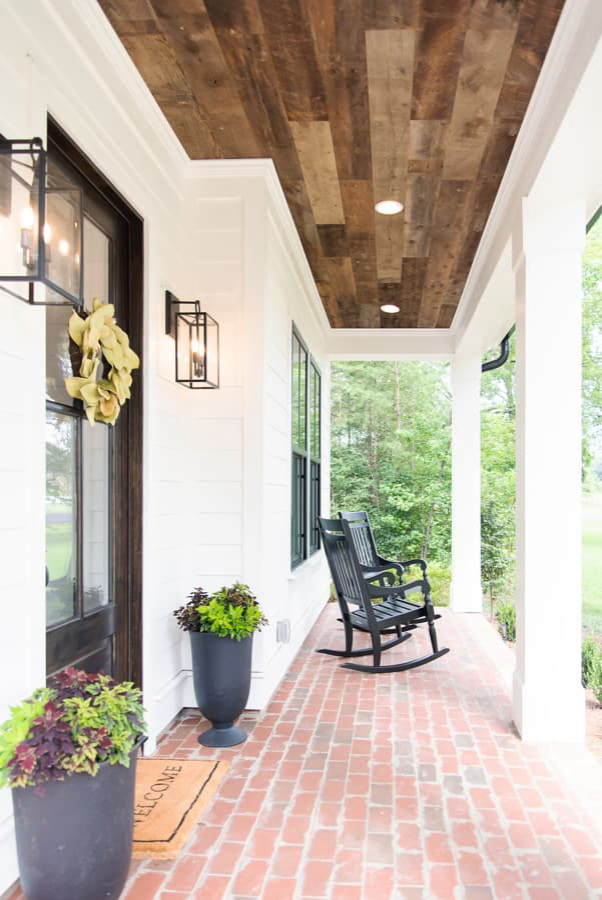 Design ideas for a country veranda in Charlotte.