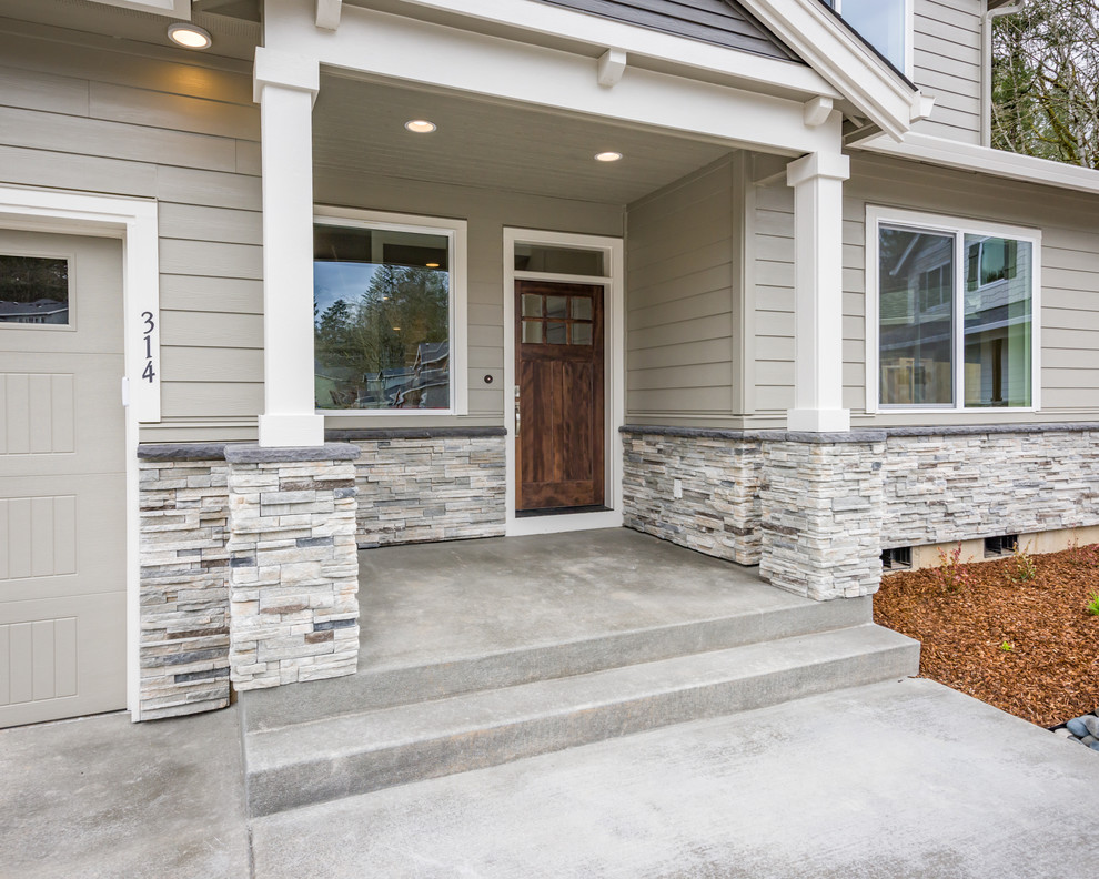Источник вдохновения для домашнего уюта: веранда среднего размера на переднем дворе в современном стиле с навесом и покрытием из бетонных плит