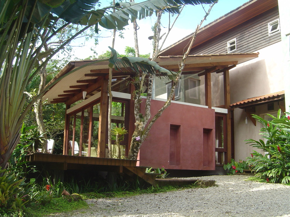 World-inspired veranda in Other with a roof extension.