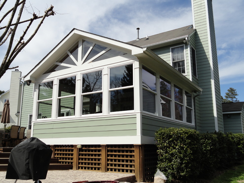 This is an example of a traditional porch design in Raleigh.