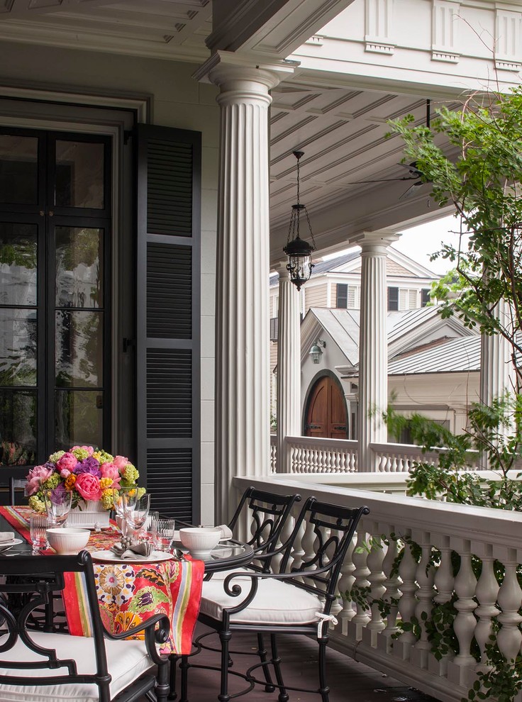 This is an example of a victorian veranda in Charleston with decking and a roof extension.