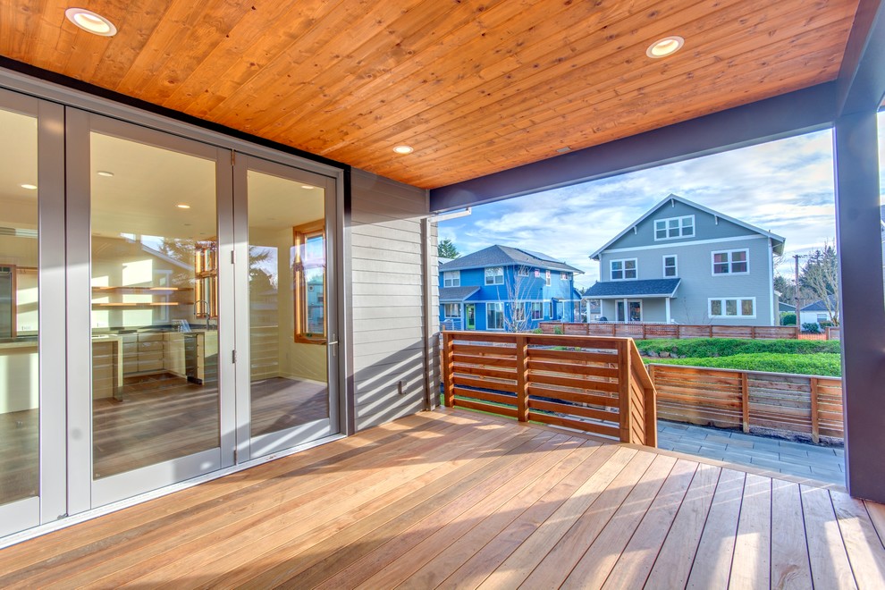 This is an example of a large contemporary veranda in Portland.