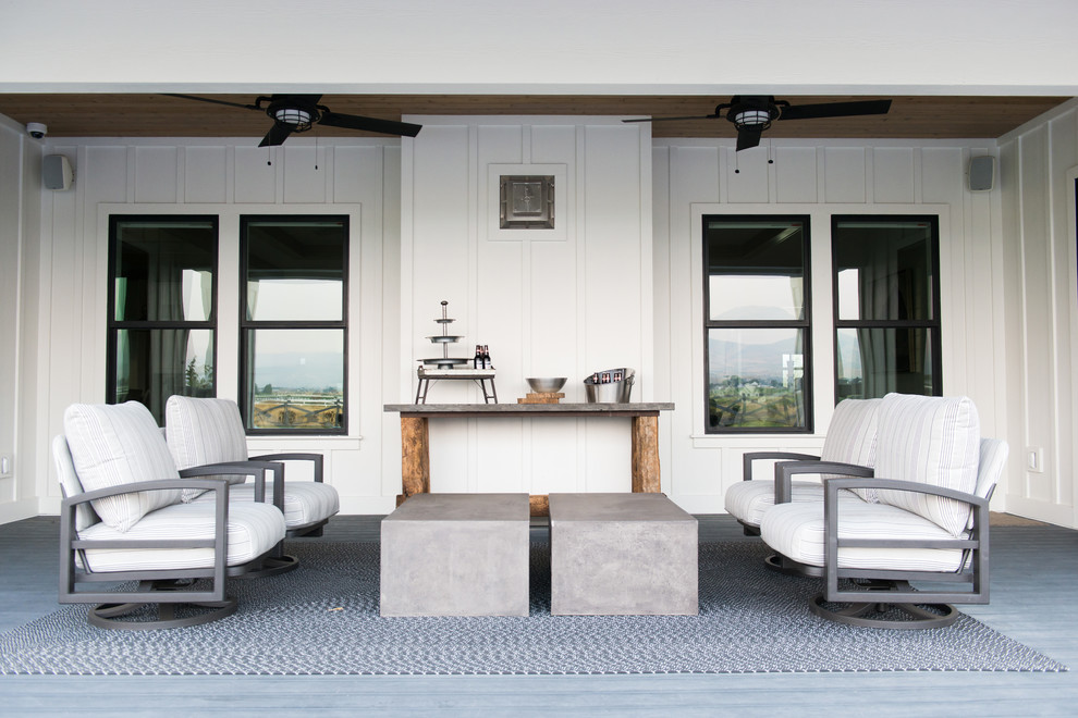 Inspiration for a nautical veranda in Salt Lake City with a roof extension.