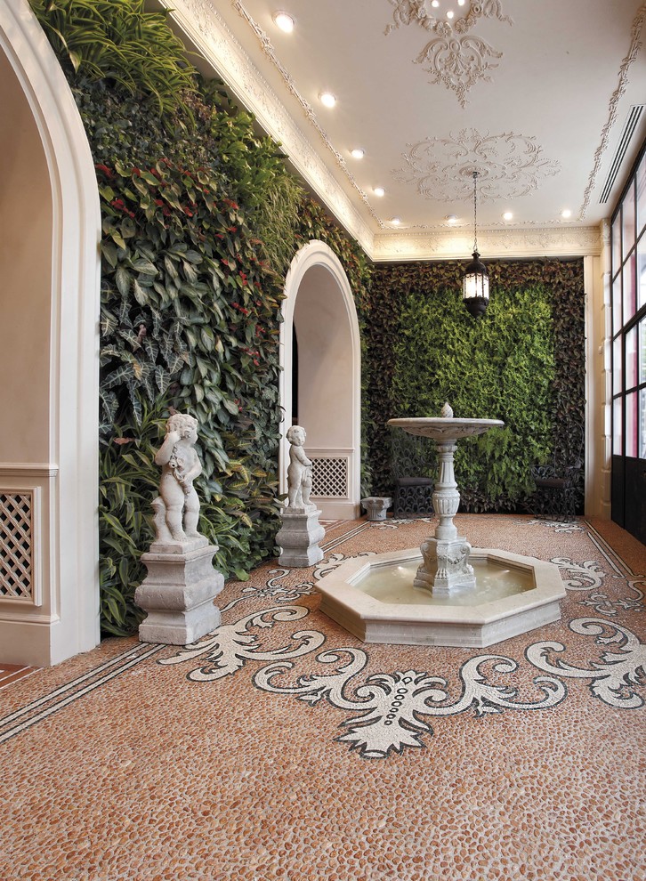 Traditional veranda in Miami with a living wall.